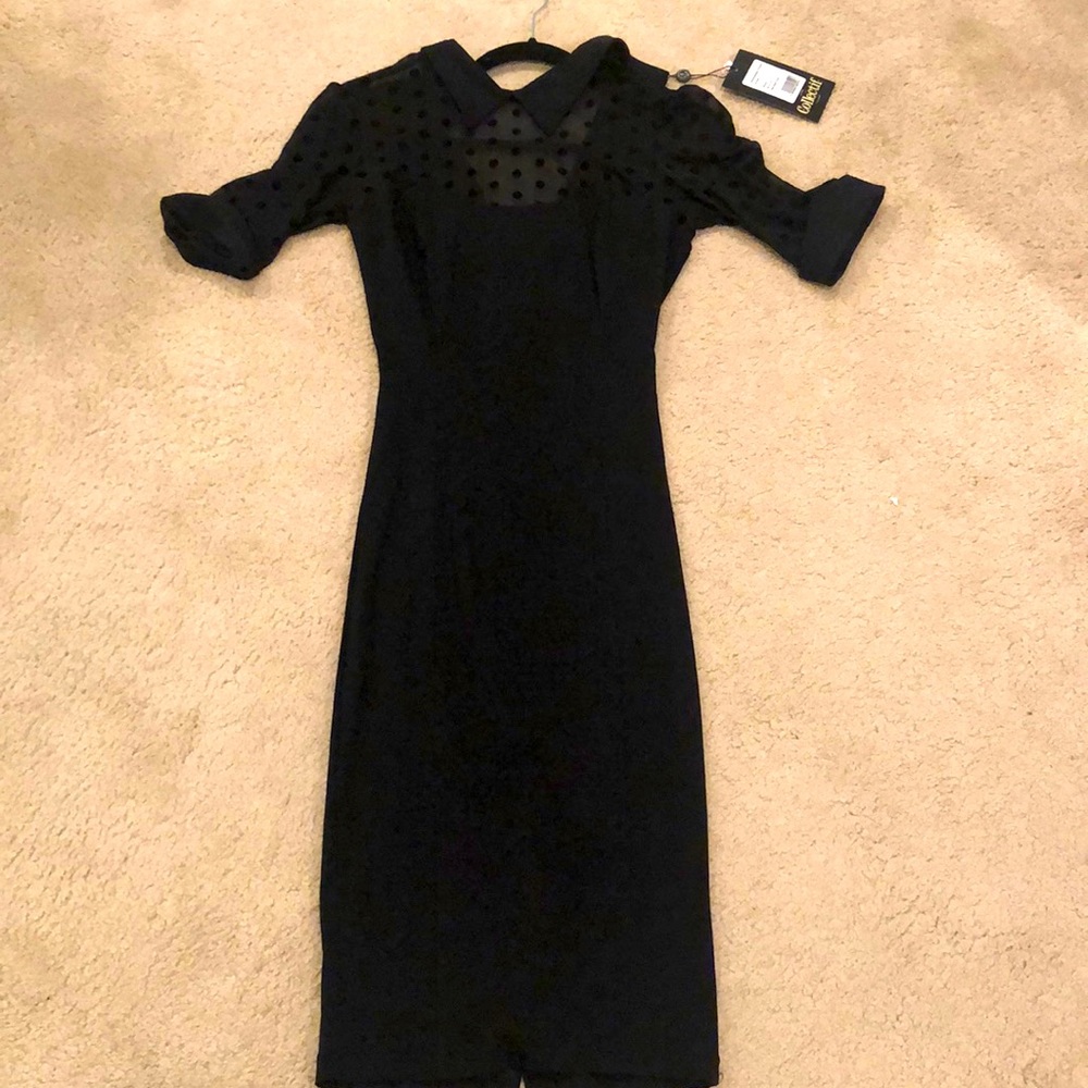 Black pencil dress with polka dots by Collectif in size Small